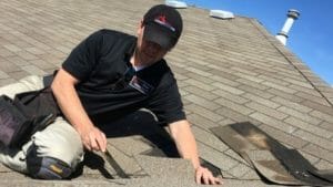 dennis-working-on-roof-small-roof-leak-fixing